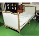 An antique French single bed with base and palliasse