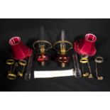 Two cranberry glass oil lamp fittings together with other related items