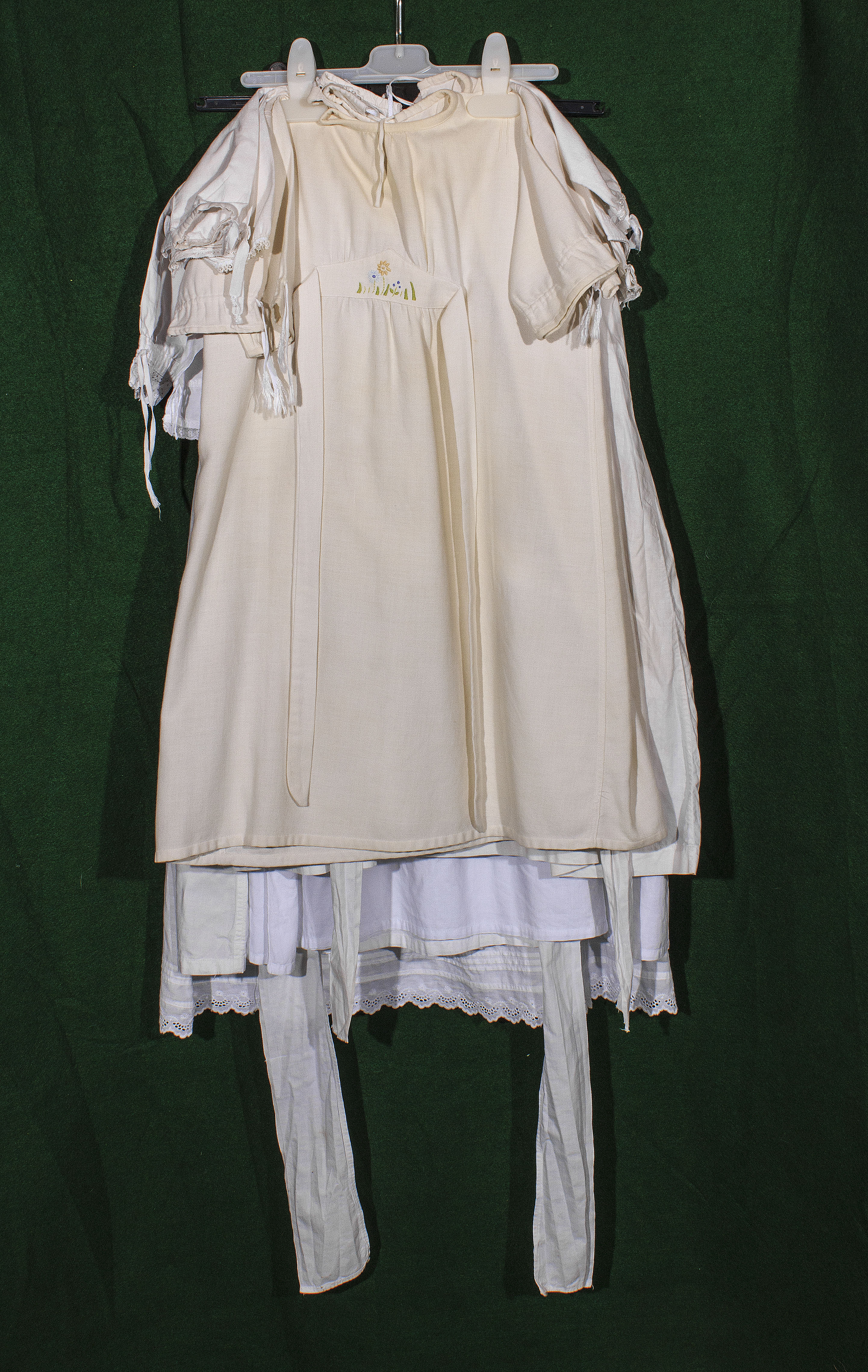 Six vintage christening gowns