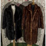 A lady's vintage fur coat and an acrylic fur coat