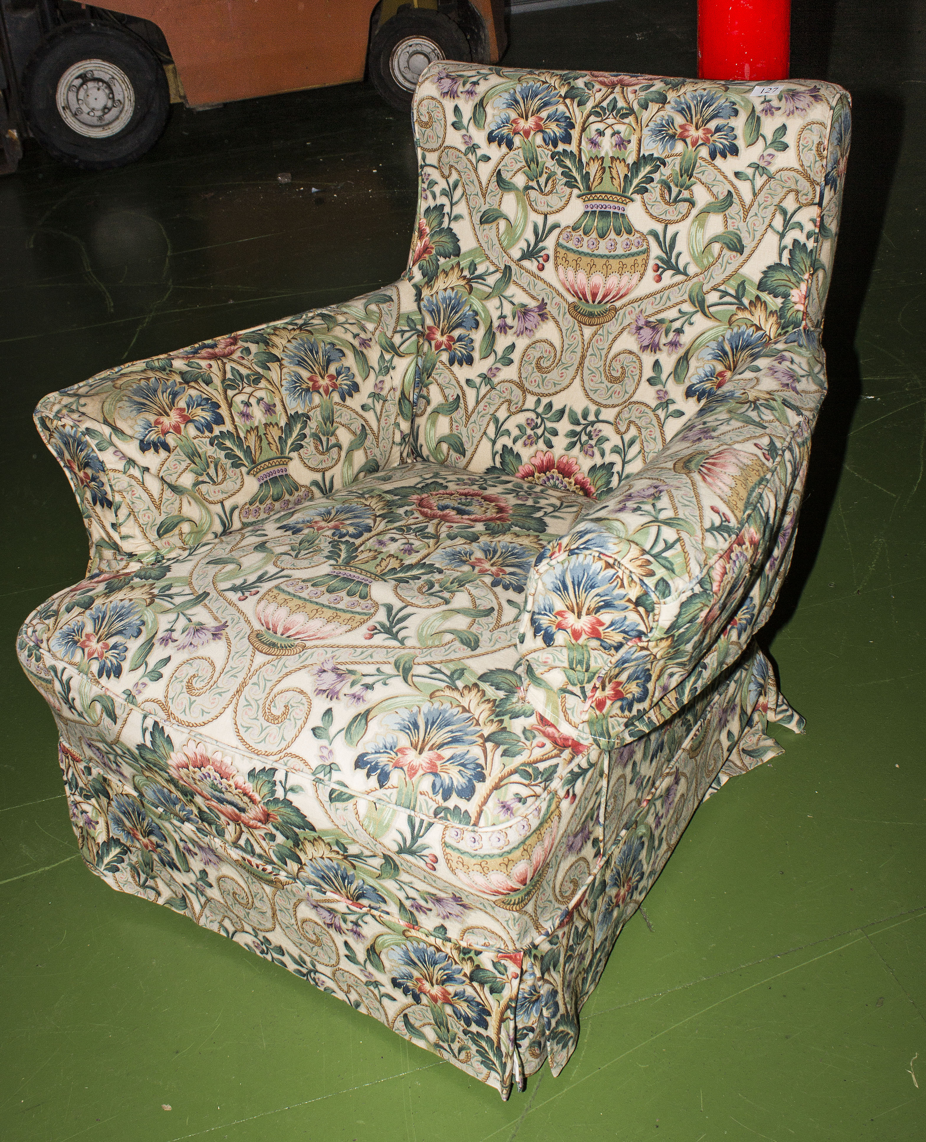 An armchair with loose covers