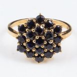A lady's 9ct gold 3gm sapphire cluster ring