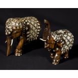 A pair of inlaid ebony elephants