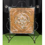 An Arts and Crafts copper and wrought iron fire screen