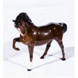 A Royal Doulton model of a prancing horse