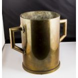 A heavy quality brass shell case mortar made inot a twin handled vase
