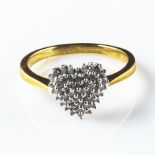 A lady's 9ct gold 3gm, 25pt 1/4 ct diamond cluster ring