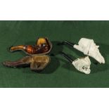 Three Meerschaum pipes