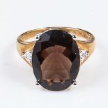 A 9ct gold lady's 4.4gm ring set with diamonds and 7ct smoky topaz