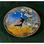 A Japanese Satsuma charger depicting cranes and foliage, 32cm diameter