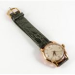 A gent's 18ct gold Lusina wristwatch with leather strap