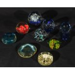 Nine glass paperweights