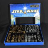 A Star Wars boxed chess set