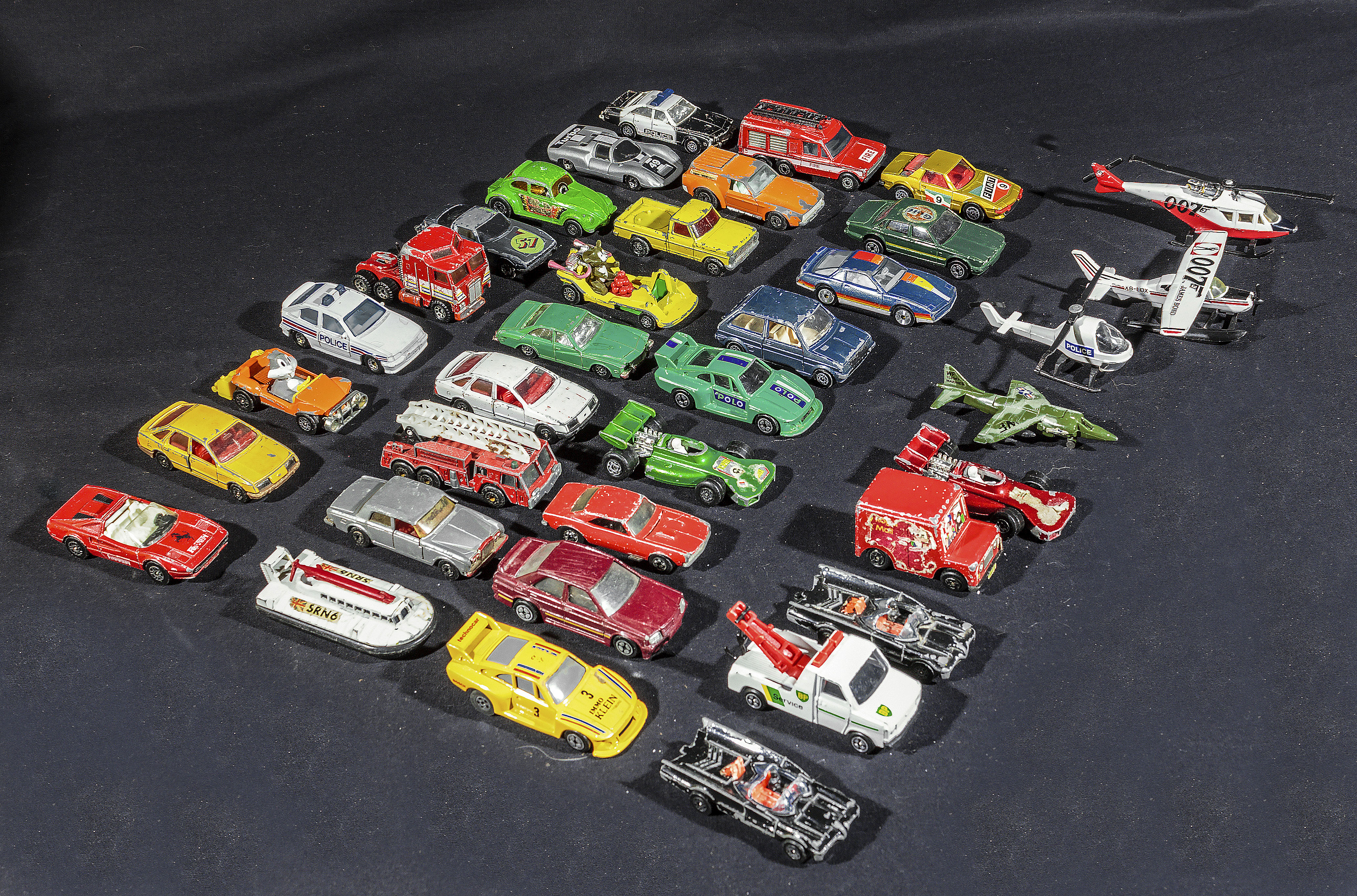 A collection of model die cast vehicles and aircraft