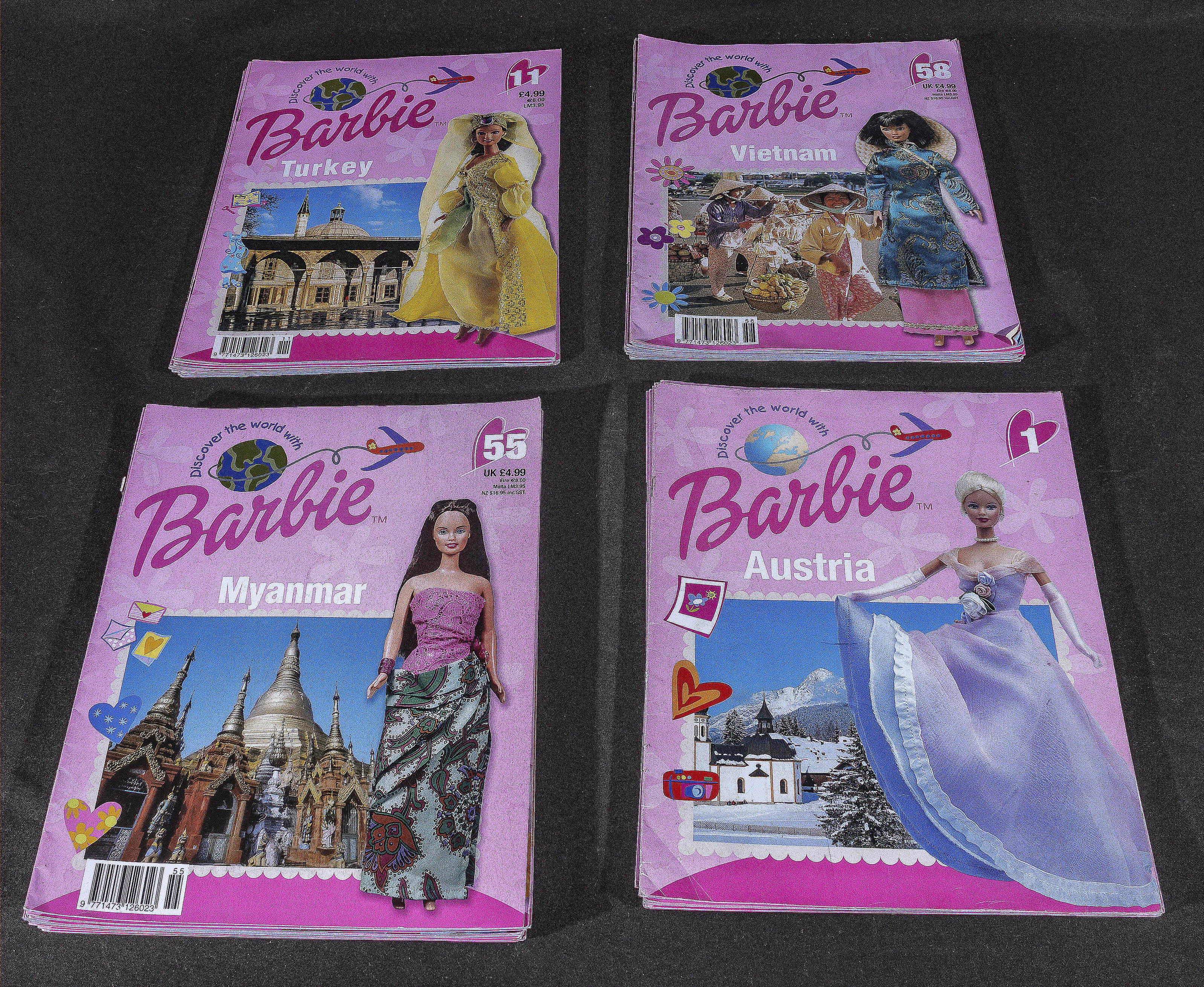 A collection of Barbie 'Discover the World' magazines. #1-21 and 32 issues between 23 and 59