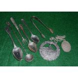 Silver spoons, tongs, brooch and pendant