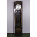 A Deco period chiming clock with 3 chrome weights and chrome pendulum. 6ft 3inches tall, In good