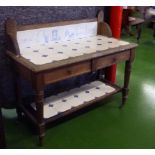 A Victorian tiled washstand 3 ft 10 inch wide, 3ft 6 inch high.