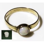 A lady's 9ct gold ring set with an opal and an ivory box