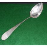 A large silver serving spoon