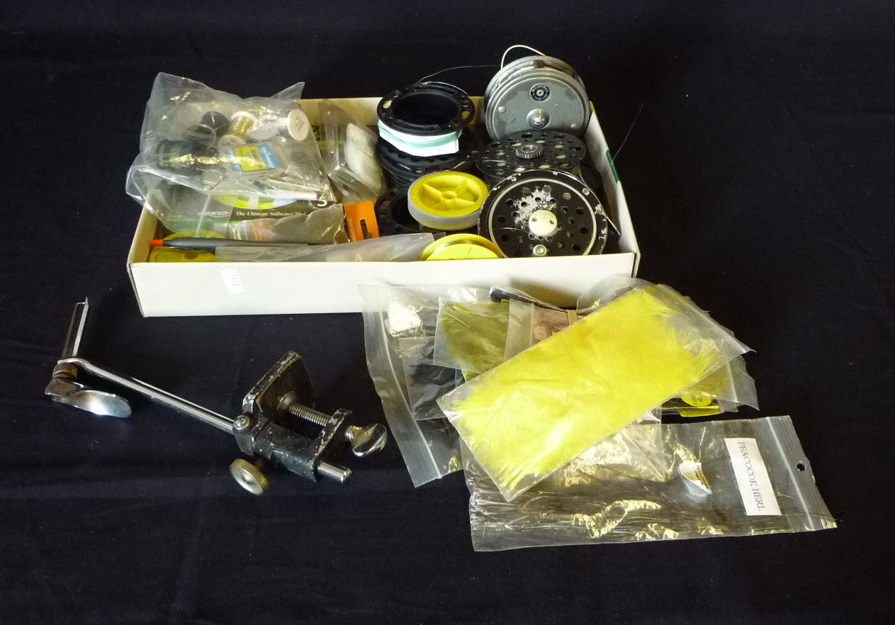 A quantity of fishing tackle including reels, fly making materials including sea rod and wind