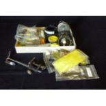 A quantity of fishing tackle including reels, fly making materials including sea rod and wind