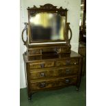 A late Victorian walnut dressing table.3 ft 6 inch by 5 ft 10 inch.