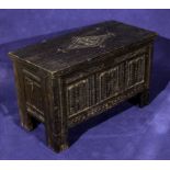 A miniature oak coffer