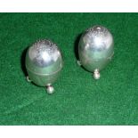 A small pair of silver salts