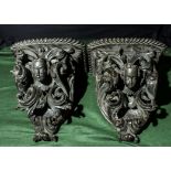 A matched pair of carved oak wall brackets. English mid Victorian, 18 inch wide by 20 inch.