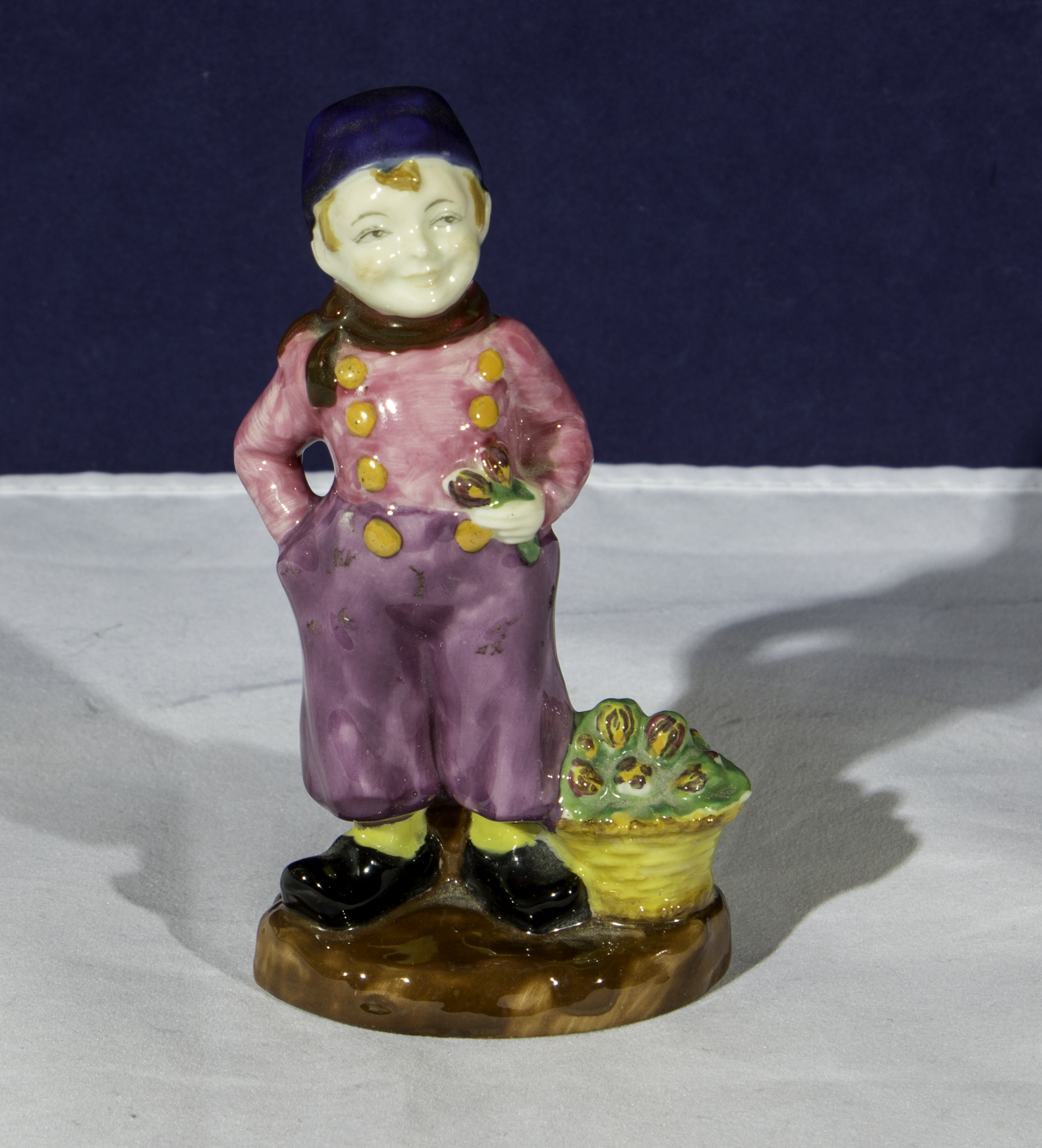 An Arcadian porcelain figure of a Dutch boy