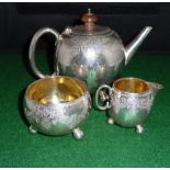 A three piece silver tea service