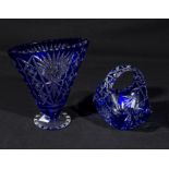 Two pieces of blue glass, vase and a basket