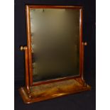 A Victorian walnut dressing mirror