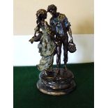 A bronze figure group on marble base, 42cm tall