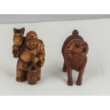 Two hardwood signed netsuke