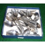 A box containing antique silver spoons