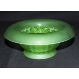 A green glass flower bowl