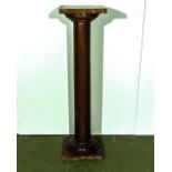 A mahogany plinth