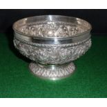 An Indian embossed silver footed bowl