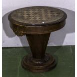 An oak games/work table on pedestal base