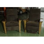 A pair of reproduction deco style adjustable arm chairs