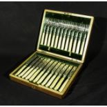 A cased set of cutlery