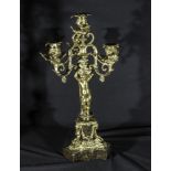A French bronze three branch candelabra on a marble base