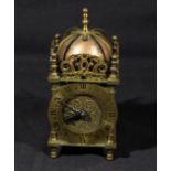 A brass lantern clock