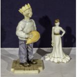 Porcelain figure of a boy with balloon together with a Coalport figure Tiffany