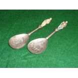 A pair of silver gilt spoons with ivory handles
