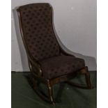 An upholstered rocking chair