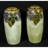 A pair of Royal Doulton Lambeth pottery vases