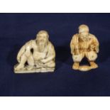 Two carved ivory figures